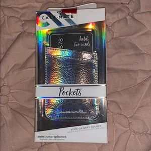 A stick on card holder for phone. Brand new.